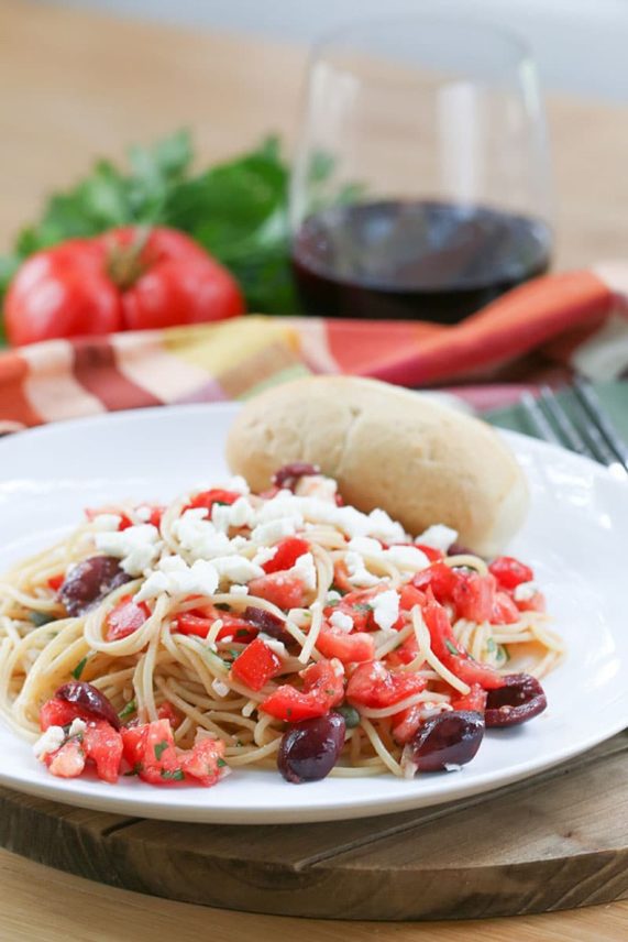Big plate of Spaghetti with Feta Cheese, Tomatoes & Kalamata Olives