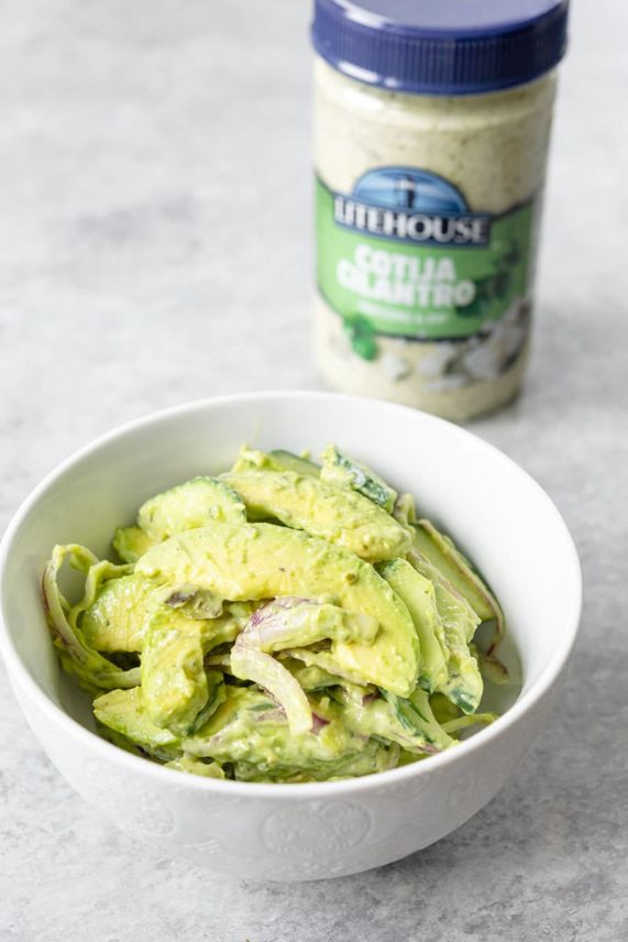 Bowl of Avocado Salad with Litehouse Cojita Cilantro Dressing ready to eat
