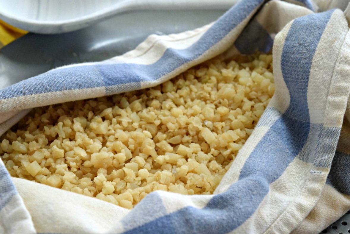 Prepping cauliflower for Blue Cheese Cauliflower Pizza Crust
