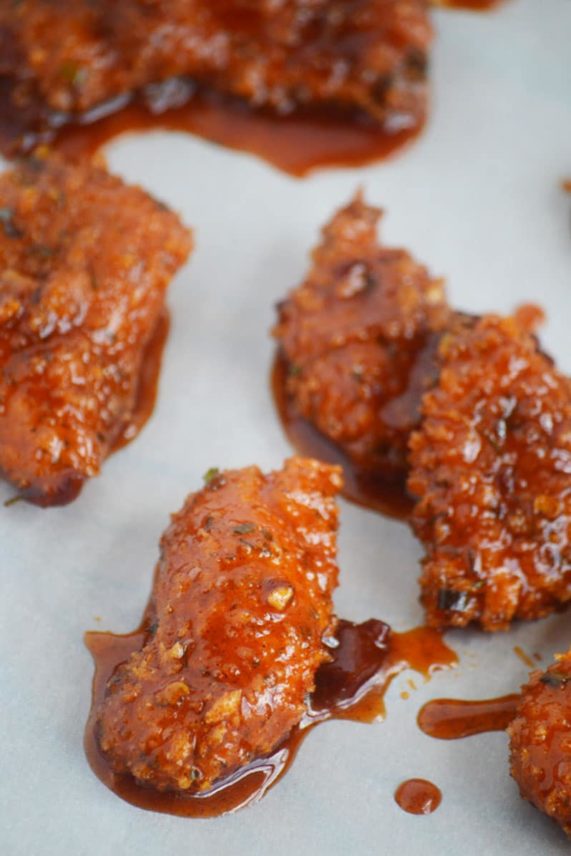 Glazing a batch of Honey Chipotle Firecracker Chicken