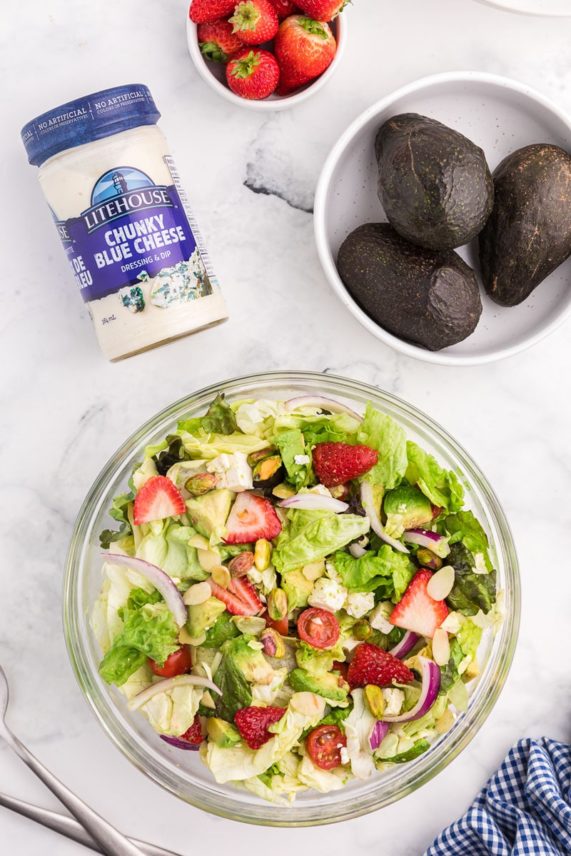 Mixing up a fresh batch of Strawberry and Avocado Salad