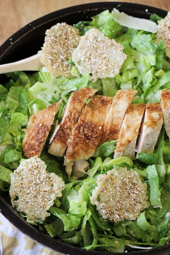Big bowl of Caesar Salad with Parmesan Cheese and Amaranth Crisps