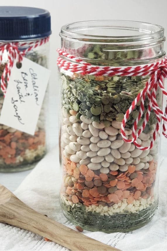 Layering a gift jar of Vegan Italian Bean & Lentil Soup Mix